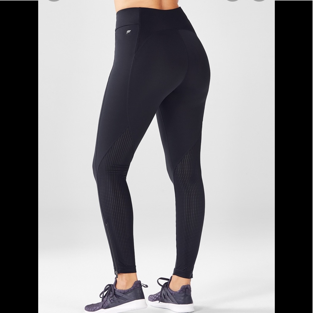 Fabletics black High-Waisted Spin Pant leggings zipper hem